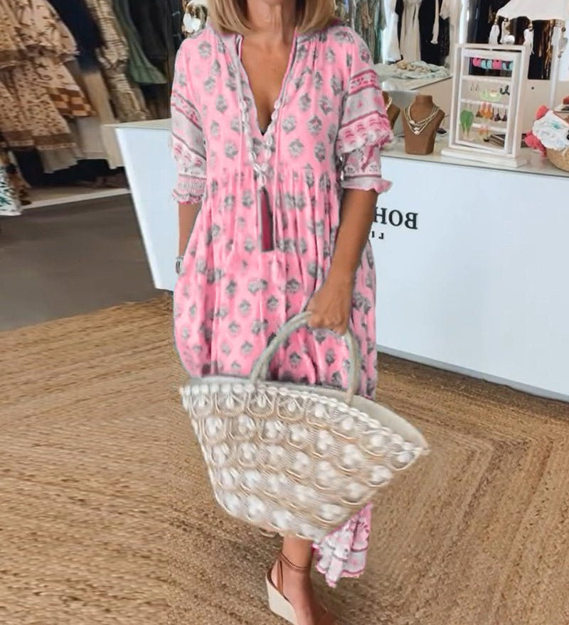 MANA | MIDI-JURK MET FLORELE PATROON EN V-HALS