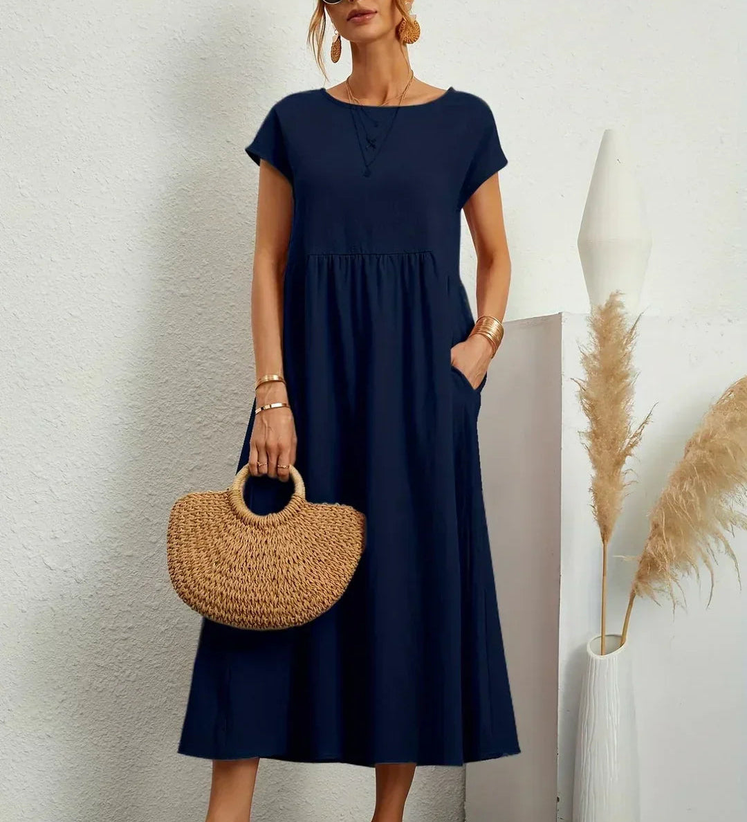 Adéla – Volné midi šaty s kapsami pro každodenní eleganci