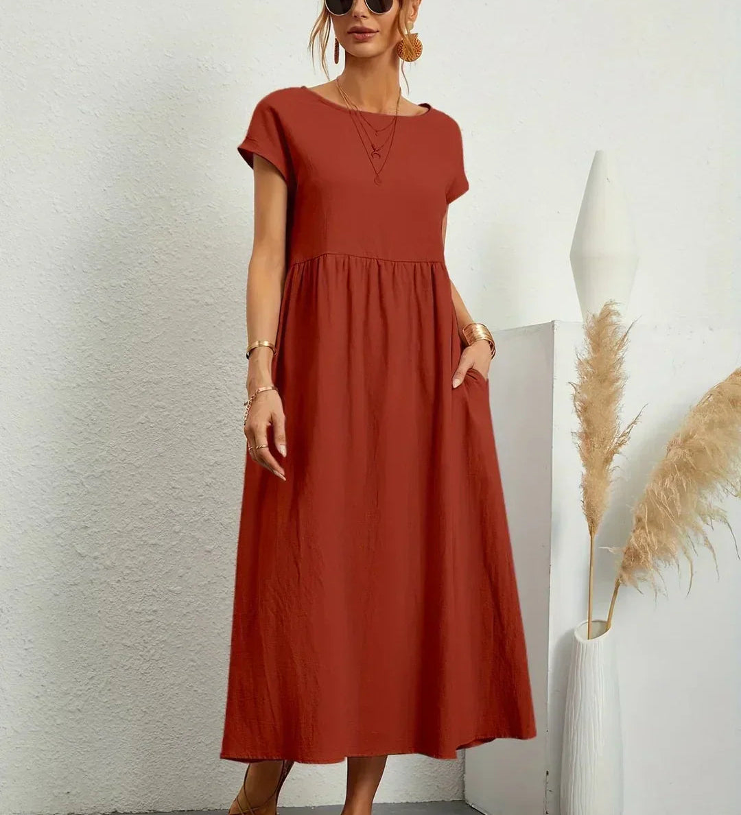 Adéla – Volné midi šaty s kapsami pro každodenní eleganci