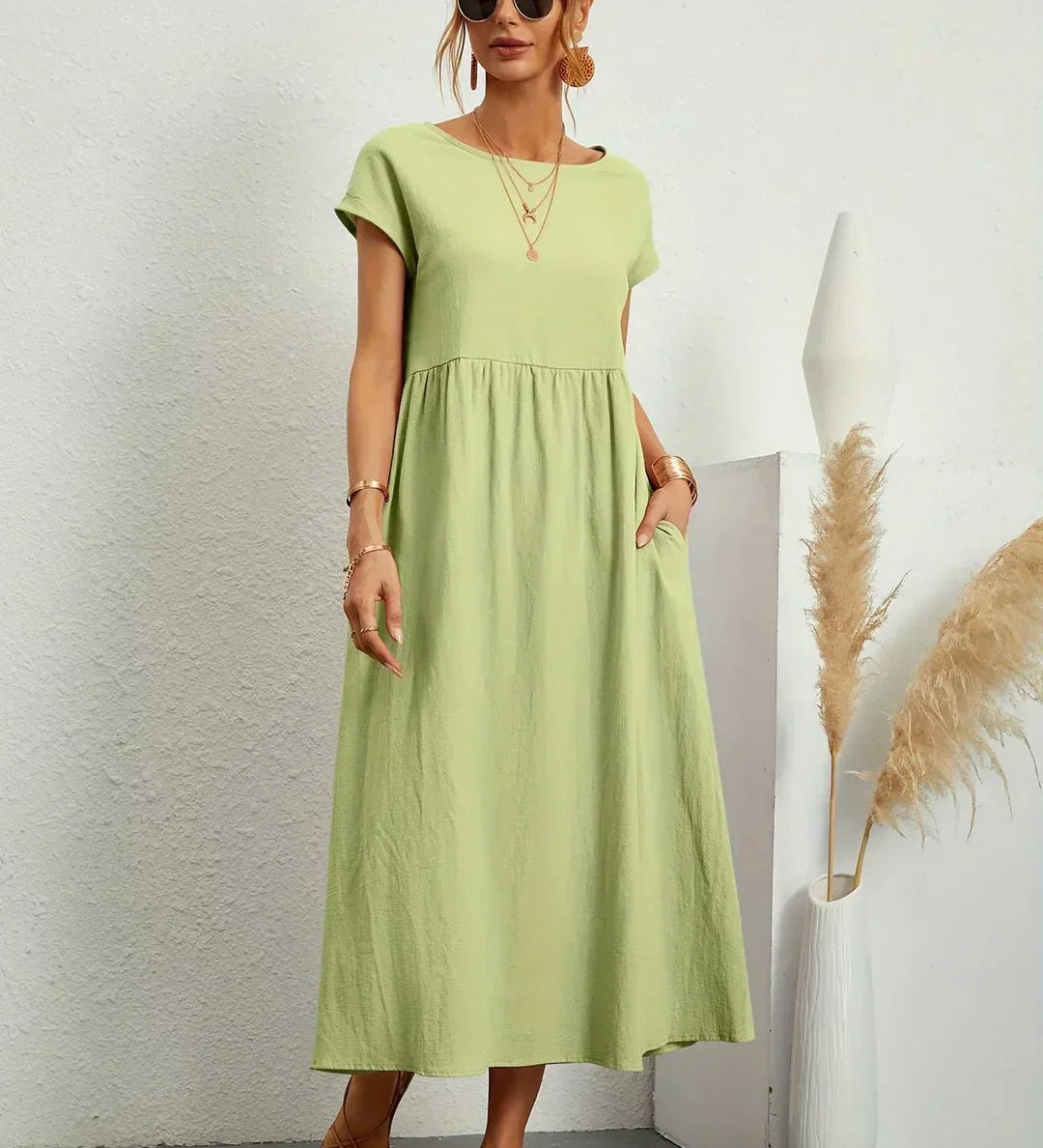 Adéla – Volné midi šaty s kapsami pro každodenní eleganci